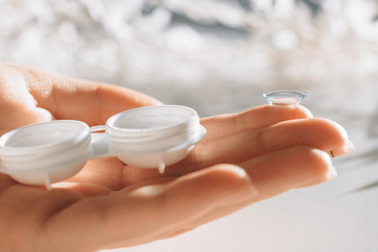 To Remove Protein Deposits From Contact Lenses: Soak And Rub
